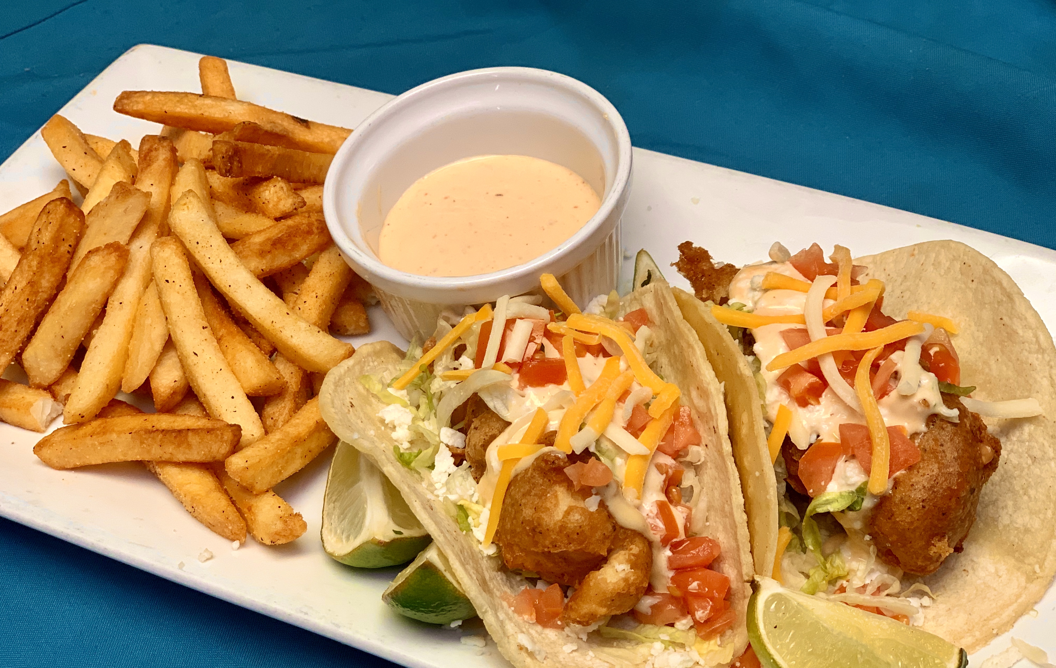 Beer Batter Fried Fish Tacos at Guadalajara Grill, Bar, & Table Side Salsa in Tucson Arizona. Beer Batter Fried Fish Tacos at Guadalajara Grill, Bar, & Table Side Salsa in Tucson Arizona.